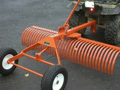 LOOKING FOR A SMALL LANDSCAPE RAKE THAT I CAN PULL WITH MY GARDEN TRAC 1