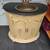 small brass sink mounted in a half moon vanity with black stone top 20 thumbnail