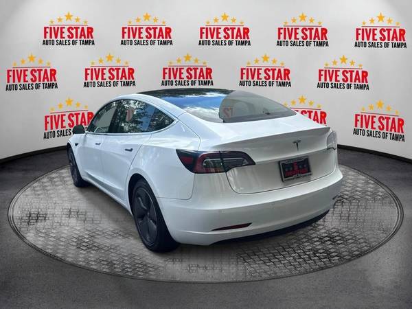 2020 Tesla {{vehicle.model}} BAJOS PAGOS INICIALES!!!!!!!!!!! Eléctrico de Autonomía Estándar - $24,995 (Five Star Auto Sales De Tampa)63443331312259124