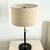 West elm 2 telescoping adjustable black metal natural linen table lamp 1 thumbnail