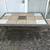 all weather tiled patio table with 4 chairs and has an option to hook 1 thumbnail
