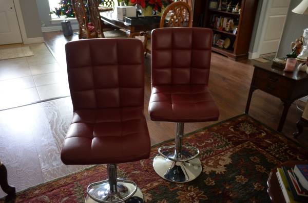 Red Leather and Chrome adjustable height stools. Two Stools 1