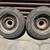 Two 13 inch wire wheels with old tires 4 thumbnail