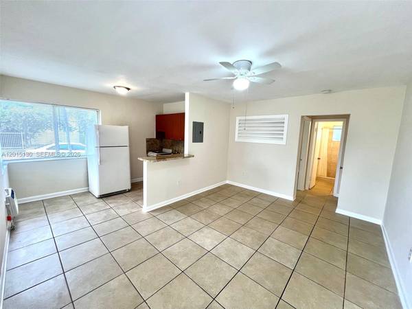This well-maintained unit features an airy 1