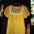 A Nice Yellow Short Sleeve Top w/ White Designs 2 thumbnail