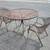 Great condition 4 piece wrought iron patio table set 5 thumbnail