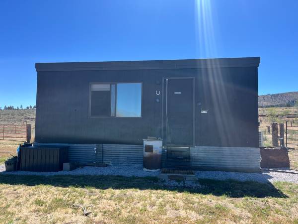 Seeking RV parking with hookups for tiny home 1