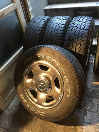 17'' ford stock 6 lug chrome wheels with 245-70-17 cooper tires 1