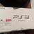 Playstation 3 Console, steering wheel, and games combo 1 thumbnail
