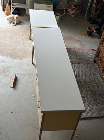 Sleek and serviceable metal desk 1