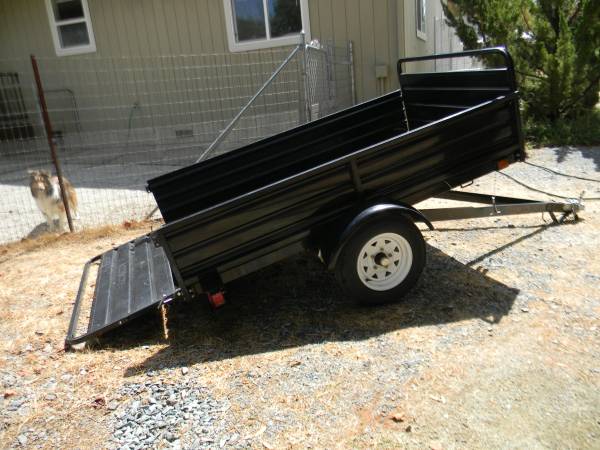 Tilt bed convertable utility trailer 1