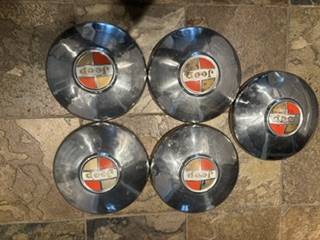 1967 Jeepster Commando hubcaps 1