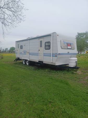 33ft 1999 sportsman camper with 12ft slide out 1