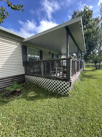 $25,000 / 2br - 924ft2 - FL Living, 2x2 1990 MH directly on Pond, with porch and carport (Whitney MHC)63823026315137121