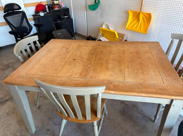 Solid wood dining table + 3 chairs. 1