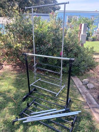 Three clothes pole hangers 1