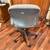 Gray Fabric Armless Office Chair on Wheels 4 thumbnail