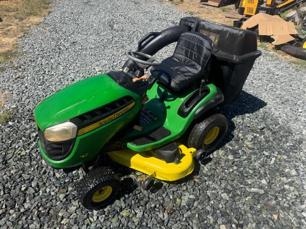 John Deere riding mower with bagger 1