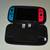 Nintendo switch with games and accessories 1 thumbnail
