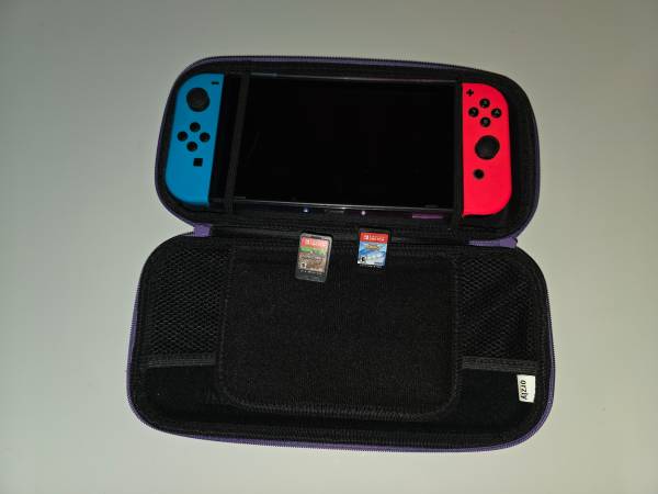 Nintendo switch with games and accessories 1