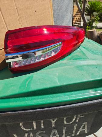Ford fusion 15-16 tail light Right Side 100 FIRM new see pictures for 1