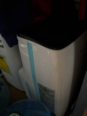 Two air conditioners tcl 7000btu and costway 8000btu 1