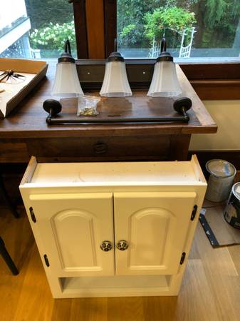 Bathroom cabinet, light fixture, towel rack 1