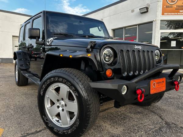 2011 Jeep Wrangler JK Sahara/Unlimited Sahara 4x4, financiamiento/garantía - $11.995 (Kenosha)63470432148993121
