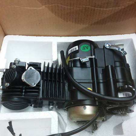 125cc, four-stroke, single-cylinder, air cooled 8.2hp, automatic trans 1