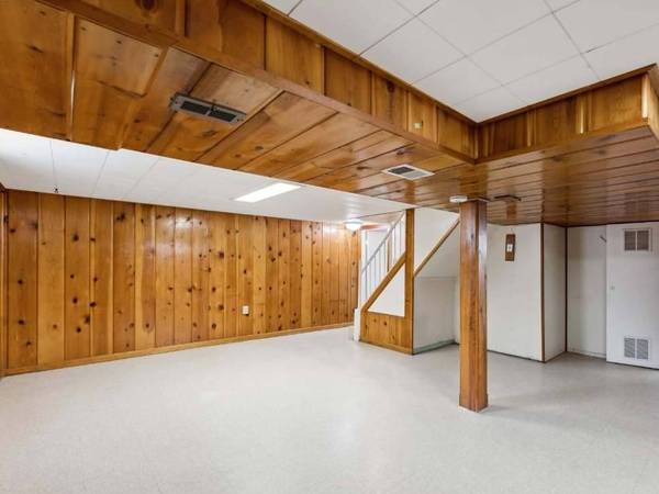 Basement living space & full bath & exit door 1