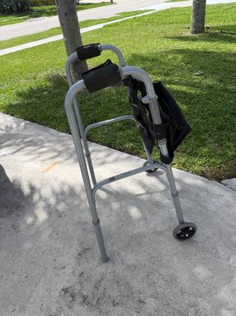 Walker (mobility aid) with comfort grips and satchel bag 1