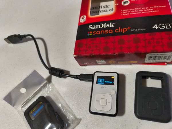 Lightly used Sansa Clip Plus Tiny MP3 Player 1