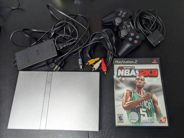 Silver PS2 Slim with controller and 2 games 1
