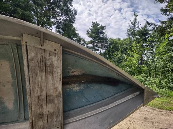 Arrowline rowboat with trolling motor 1