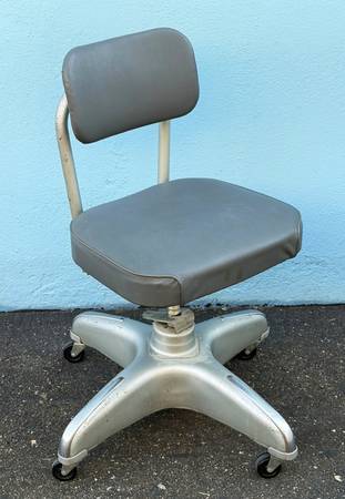 Vintage Cole propeller base rolling office chair 1