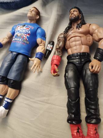 2 wwe figures w/ mini mic 1