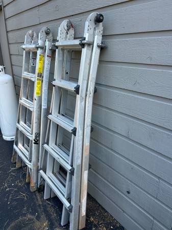 2 Multi-position ladders 22’ max reach each 1