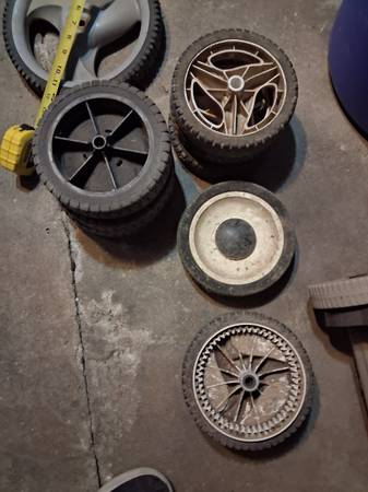 Assorted different lawn mower wheels 1