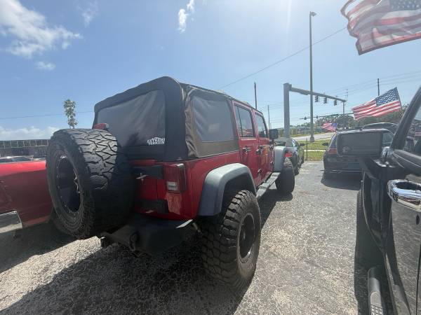 2011 Jeep Wrangler Unlimited - $13,499 (Holiday)63443316081793122