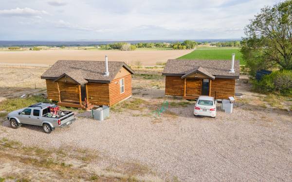 $199,750 / 2br - 768ft2 - Two Updated Wyoming Log Cabins on .76 Acres (94B Cliff Drive, Riverton, WY)