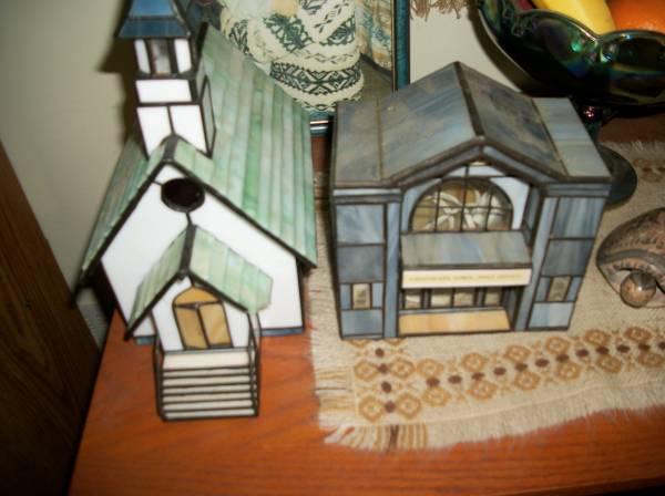 two leaded colorful glass buildings  with lights for inside 1