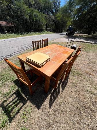 Solid oak table  and chairs unupholstered 1