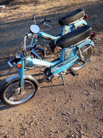 Two Blue/Silver 1980 motobecane mopeds