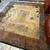 10 ft x 10 ft brown/black/camel area rug - brand new never used. 1 thumbnail