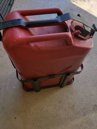 Jerry can and mounting bracket and spout - $50 (Doylestown)63442996248579124