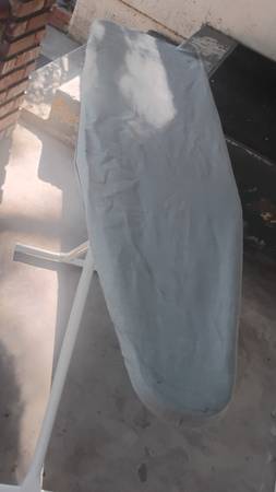 Full-sized ironing board, 4-ft long, 3.5-ft tall, like new 1