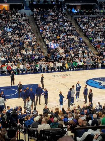 Timberwolves tickets behind home bench 1