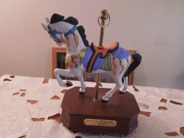 White carousel horse on dark wood base 1