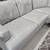 Light Grey Leather Sectional Sofa with rotating chaise/ottoman 2 thumbnail