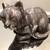 Vintage Cat Sitting/Napping Glazed Terracotta Statue (purple). 1 thumbnail